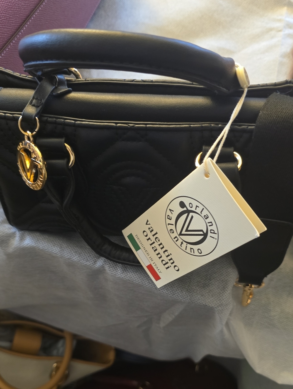 Black Quilted Satchel with Gold Accents